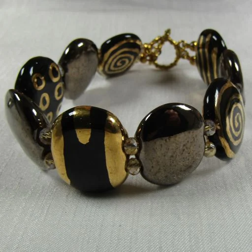 Elegant bridal necklace for women with sparkling stones and delicate craftsmanship -Black & Gold Kazuri Cuff Bracelet