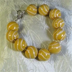 Vintage cameo necklace for women with a romantic, classic design and antique charm -Bright Bold Yellow Fair Trade Kazuri Large Bead Bracelet