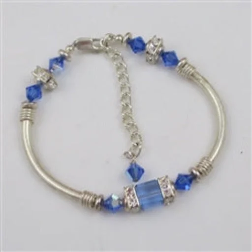 Contemporary pendant necklace for women with minimalist design and sleek finish -Blue Crystal and Silver Bangle Bracelet