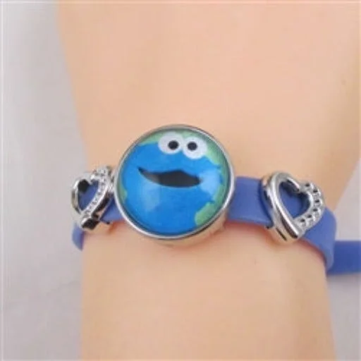 Silver pendant necklace for men with a modern design and subtle charm -Cute Child's Blue Vinyl Cookie Monster Bracelet