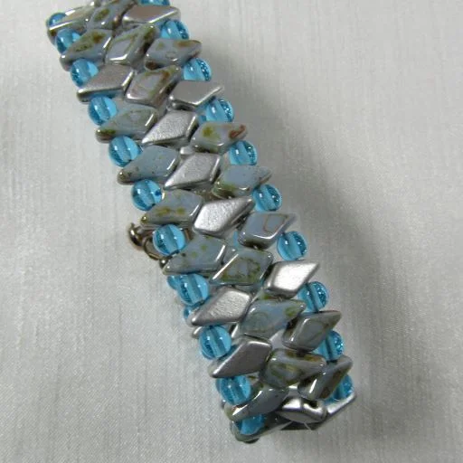 Luxury diamond and platinum necklace for women with high-end materials and sophisticated look -Fashionable Aqua & Gray Crystal Beaded Cuff Bracelet