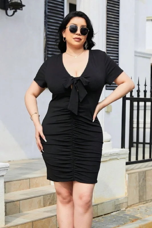 Plus size dresses with soft textures feel cozy -Dress for clubbing-Plus Size Ruched Tied Short Sleeve Mini Dress